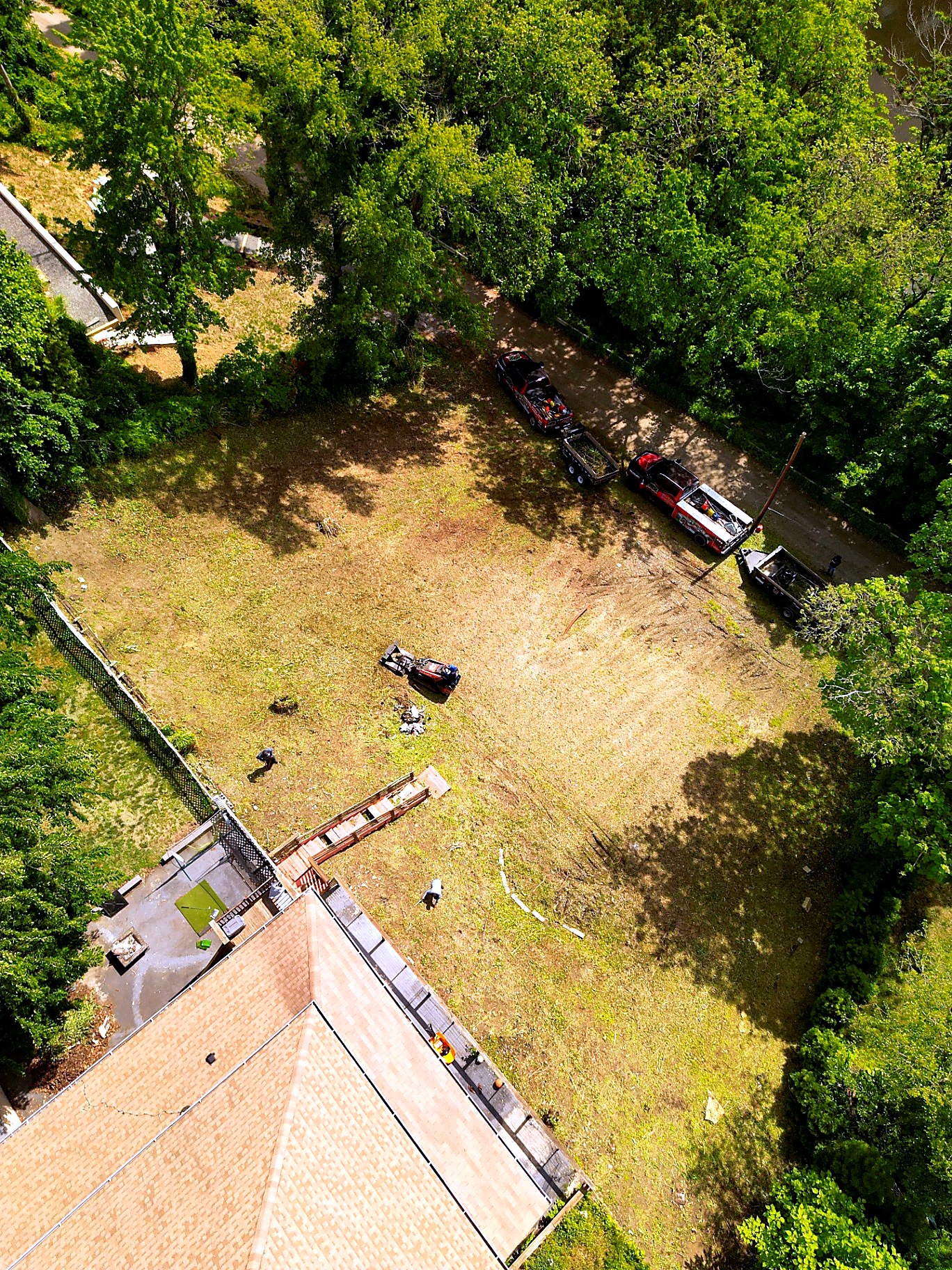 Aerial view of brush clearing and cleanup work at a residential property in New Jersey